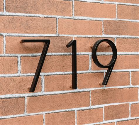 custom house numbers metal black floating on brick wall|metal floating house numbers.